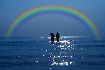 Image showing secret date under rainbow