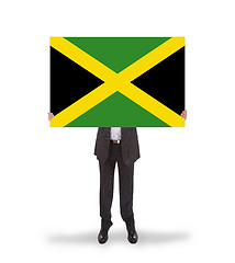 Image showing Businessman holding a big card, flag of Jamaica