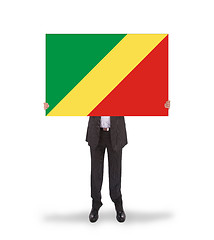 Image showing Businessman holding a big card, flag of Congo