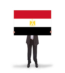 Image showing Businessman holding a big card, flag of Egypt