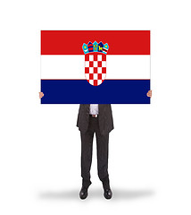 Image showing Businessman holding a big card, flag of Croatia