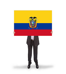 Image showing Businessman holding a big card, flag of Ecuador