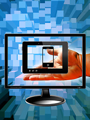 Image showing hand with modern monitor, mobile phones and tablet