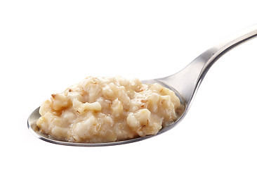 Image showing Spoon of oats porridge