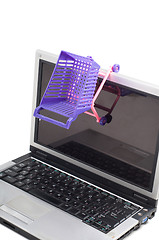 Image showing Laptop with a shopping-cart
