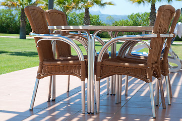 Image showing Chairs and table near apartments