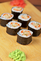 Image showing sushi rolls with tobico and pancake