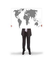 Image showing Businessman holding a big card, world map