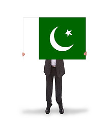 Image showing Businessman holding a big card, flag of Pakistan