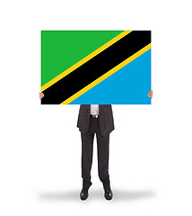 Image showing Businessman holding a big card, flag of Tanzania