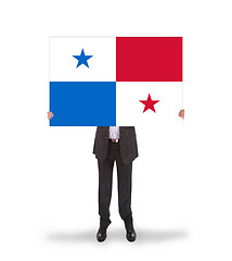 Image showing Businessman holding a big card, flag of Panama