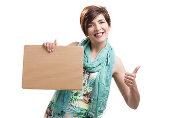 Image showing Beautiful woman with a cardboard