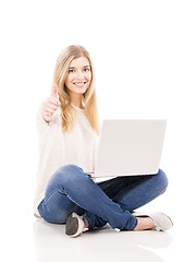 Image showing Woman working on a laptop