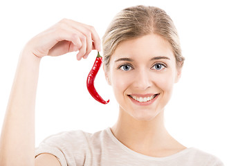 Image showing Beautiful woman holding a red chilli pepper