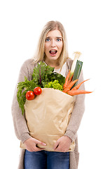 Image showing Beautiful woman carrying vegetables