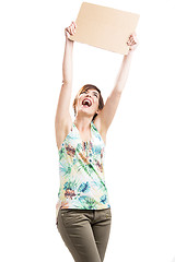 Image showing Happy woman holding with a cardboard