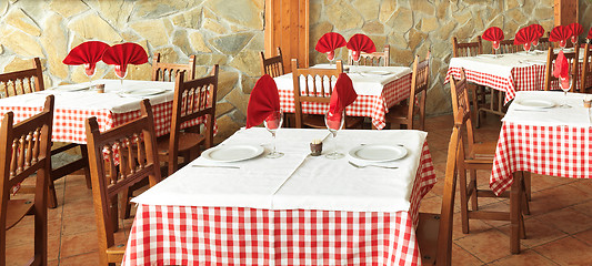 Image showing rustic restaurant tables