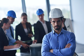 Image showing business people and engineers on meeting