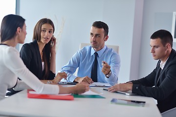 Image showing business people in a meeting at office