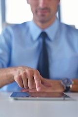 Image showing business man use tablet compuer at office