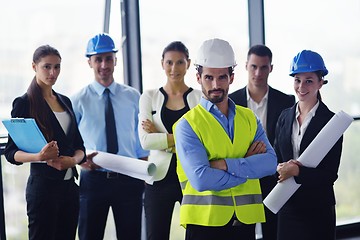 Image showing business people and engineers on meeting