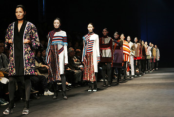 Image showing Asian models on the catwalk (focus on the front model)