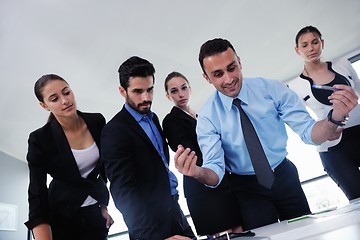 Image showing business people in a meeting at office