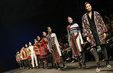 Image showing Asian models on the catwalk (focus on the front model)