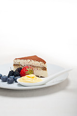 Image showing tiramisu dessert with berries and cream