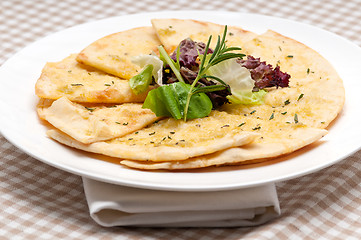 Image showing garlic pita bread pizza with salad on top