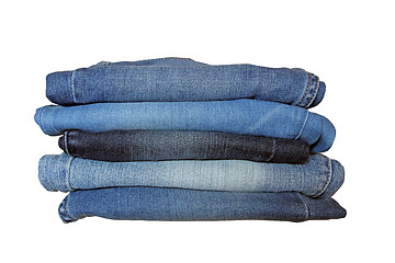 Image showing Stack of Blue Jeans over White