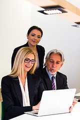 Image showing Group in business meeting with laptop