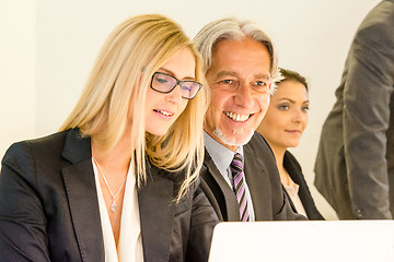 Image showing Group in business meeting with laptop