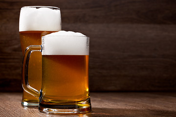 Image showing Two glass beer on wooden table