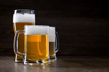 Image showing Two glass beer on wooden table