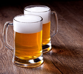 Image showing Two glass beer on wooden table