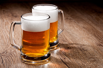 Image showing Two glass beer on wooden table