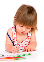 Image showing Little baby girl draws pencil