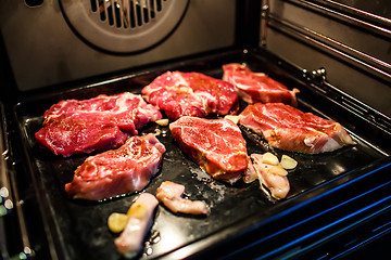 Image showing Pork cooked in oven.