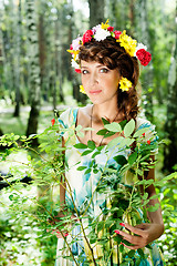 Image showing Attractive woman with flower wreath