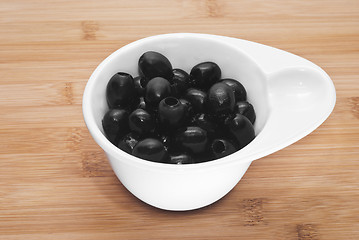 Image showing Pitted black olives