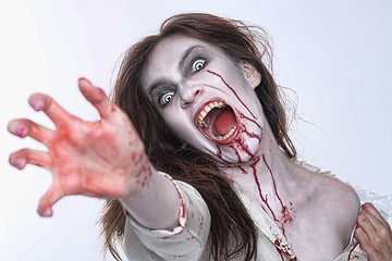 Image showing Psychotic Bleeding Woman in a Horror Themed Image