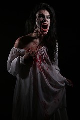 Image showing Psychotic Bleeding Woman in a Horror Themed Image