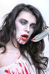 Image showing Image of a Bleeding Psychotic Woman