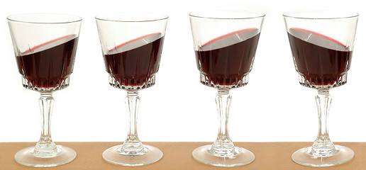 Image showing Wineglasses on a line