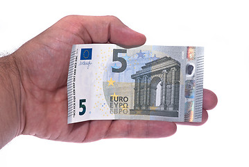 Image showing New ticket 5 euros in man hand