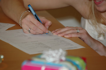 Image showing Signing the wedding contract