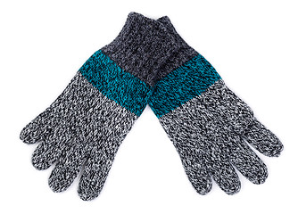 Image showing knitted gloves on white background