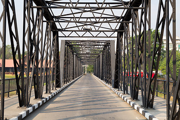 Image showing Road through metal bridge tunnel