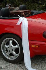 Image showing Red wedding car